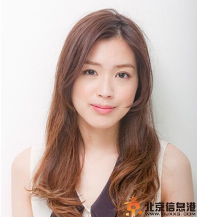 长卷发丸子头扎法 让你瞬间清爽变身