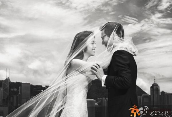 汤唯金泰勇婚纱照曝光 两人正式结为夫妻