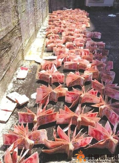 温岭土豪晒钱因保险箱被盗 253万元现金全湿