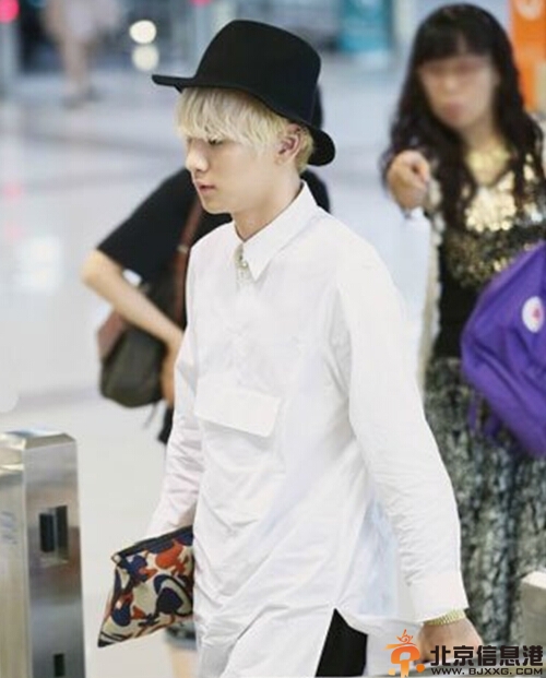 <a href='http://www.bjxxg.cn/ent/mingxing/' target='_blank'><u>韩国明星</u></a>机场街拍 装扮别有一番韵味