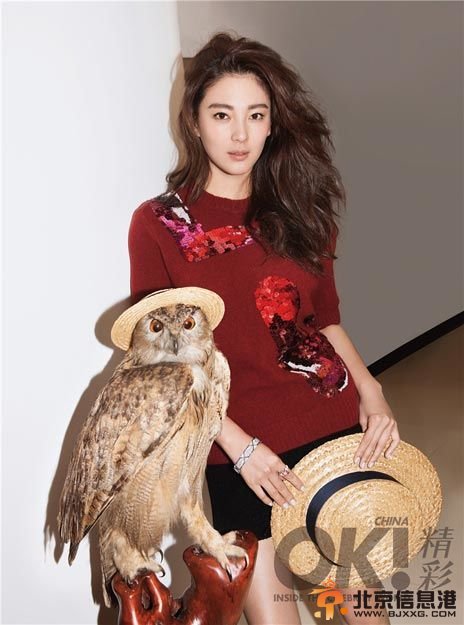 张雨绮性感魔幻登封面与猫头鹰青蛙合照 性感指数爆表【图】
