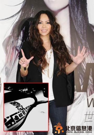 张惠妹男友晒“爱的纹身” 疑好事将近(组图)