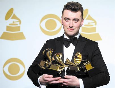 格莱美颁奖礼 男版阿黛尔之城英国新人歌手萨姆·史密斯包揽了四个大奖