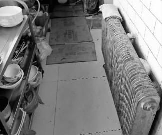 司机酒驾被查后弃车逃入饭店 假扮厨师切菜(图)